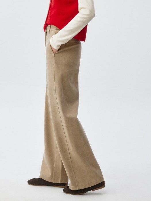 широкие брюки из костюмной ткани из россии вид сбоку
