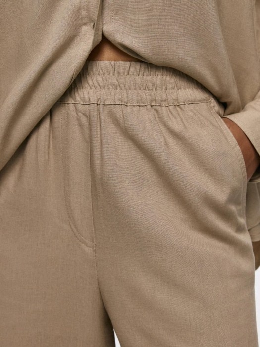 широкие брюки из вискозы и льна из россии вид сбоку