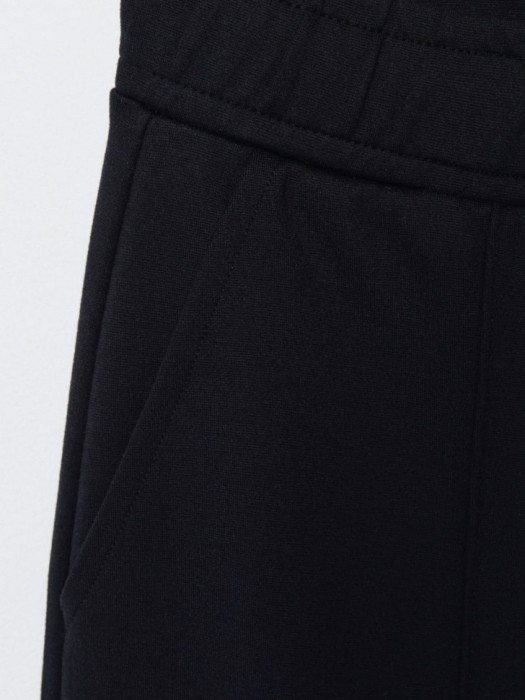 широкие брюки на резинке для девочек из россии вид сбоку