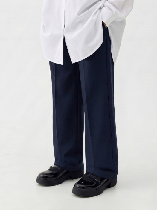широкие брюки на резинке для девочек от бренда sela вид слева