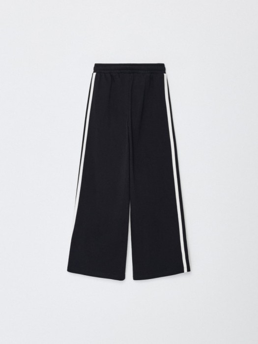 широкие брюки с лампасами для девочек из россии вид сбоку