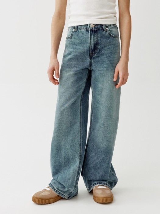 широкие джинсы для девочек от бренда sela вид слева