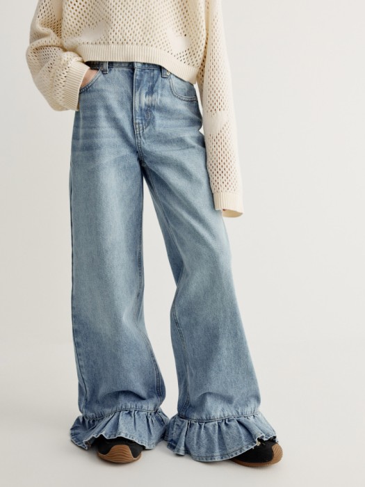 широкие джинсы с оборками для девочек от бренда sela вид слева