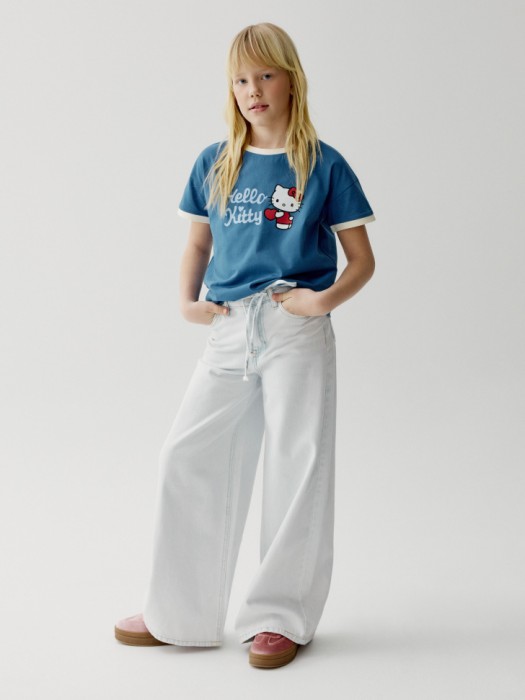 широкие джинсы со шнурком для девочек от бренда sela вид слева