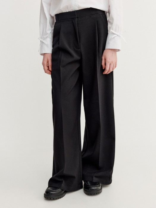 широкие костюмные брюки для девочек от бренда sela вид слева