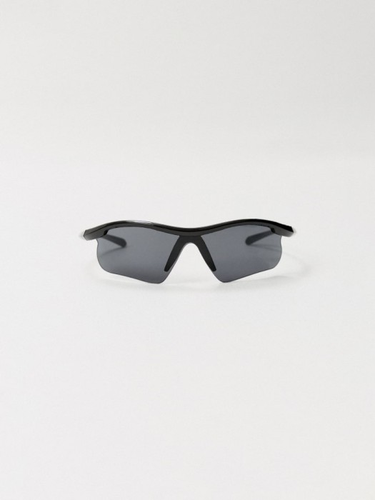 солнцезащитные очки в спортивном стиле детские от бренда sela вид слева