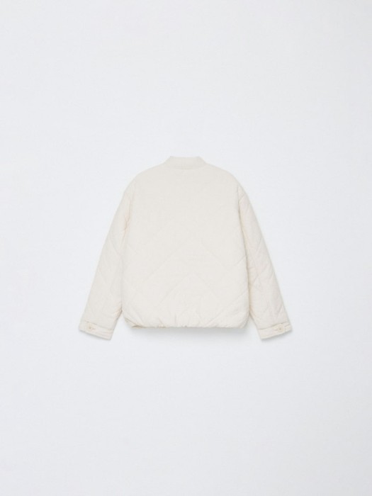 стеганая куртка для девочек от бренда sela вид слева