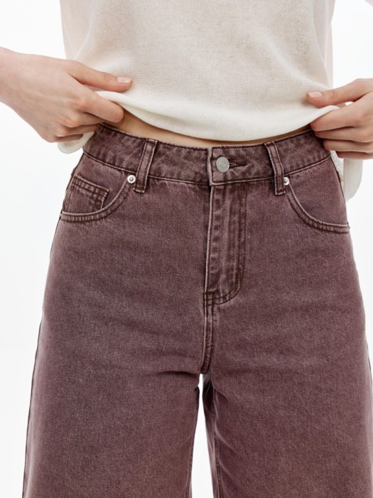 свободные джинсовые шорты бермуды с высокой посадкой от бренда sela вид слева