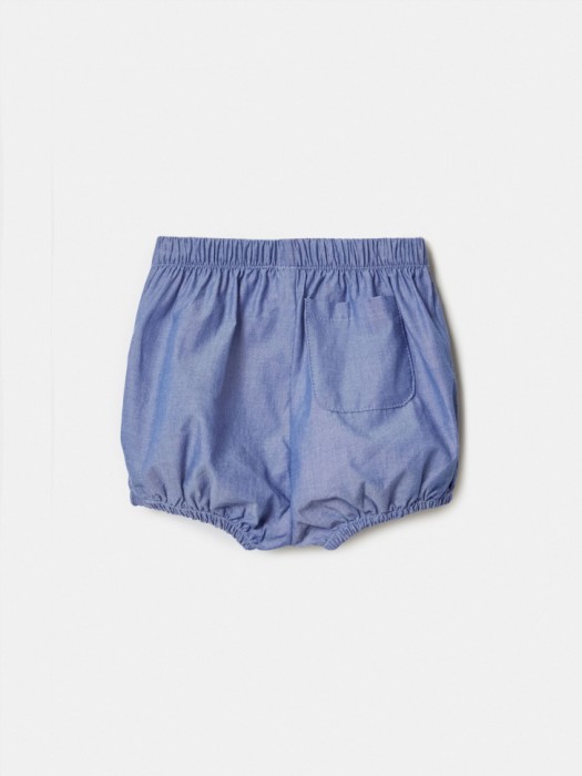 свободные шорты для малышей от бренда sela вид слева