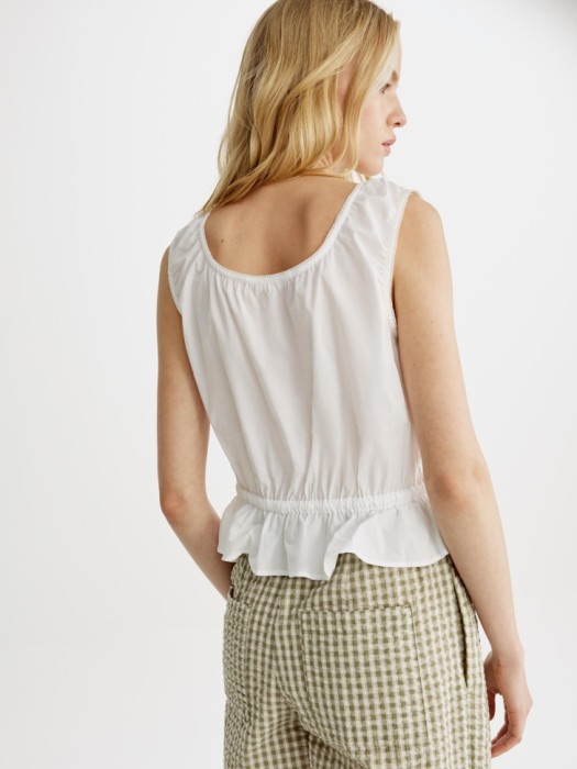 топ из хлопка с баской и завязками по цене 2799 руб вид справа