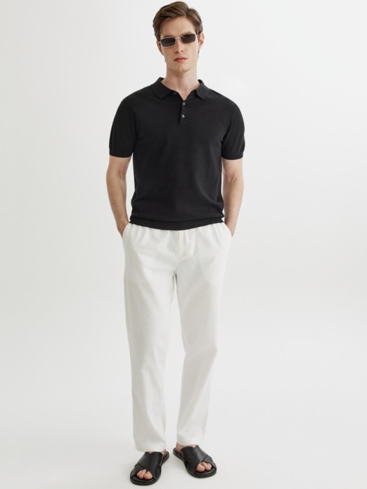 трикотажное поло с коротким рукавом от бренда sela вид слева