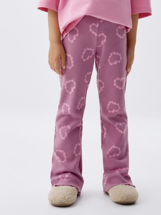 трикотажные брюки клеш с принтом для девочек от бренда sela вид слева