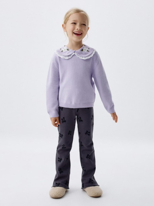 трикотажные брюки клеш с принтом для девочек по цене 999 руб вид справа