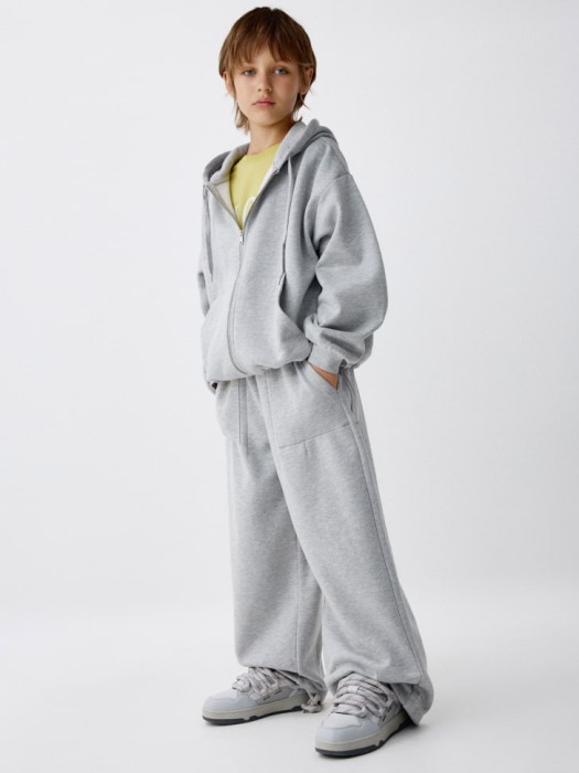 трикотажные брюки оверсайз детские от бренда sela вид слева