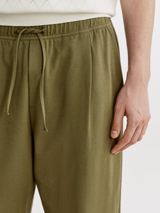 трикотажные брюки прямого кроя из россии вид сбоку