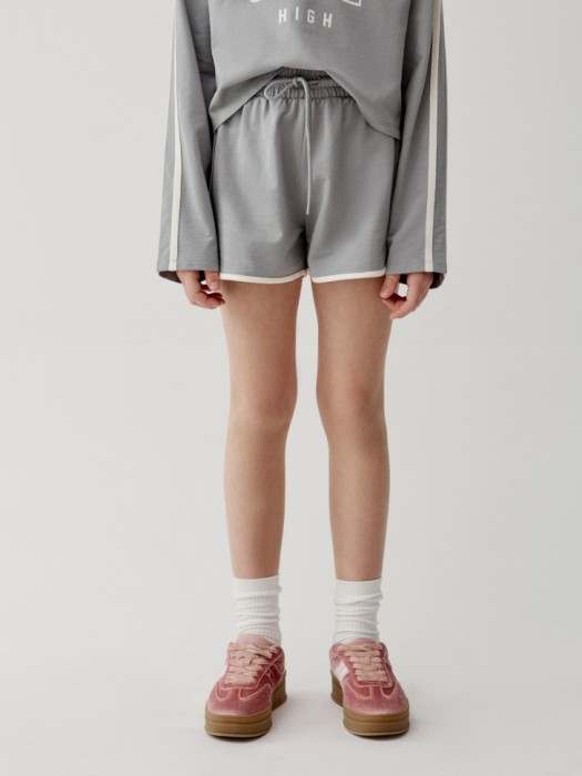 трикотажные шорты для девочек от бренда sela вид слева