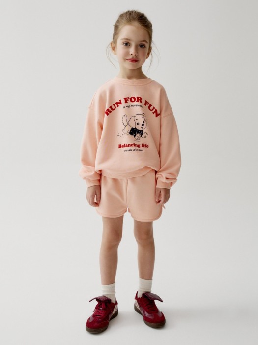 трикотажные шорты фигурными карманами для девочек от бренда sela вид слева