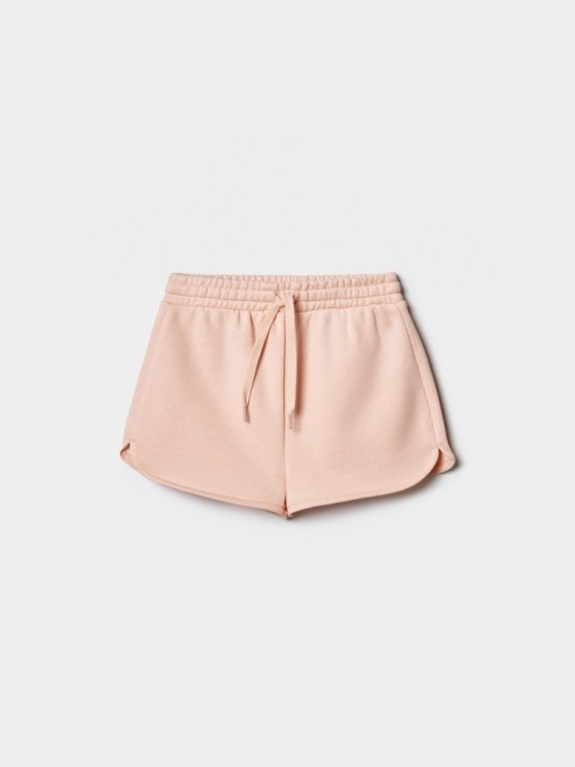 трикотажные шорты фигурными карманами для девочек по цене 1299 руб вид справа