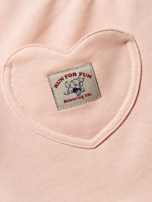 трикотажные шорты фигурными карманами для девочек из хлопка спереди