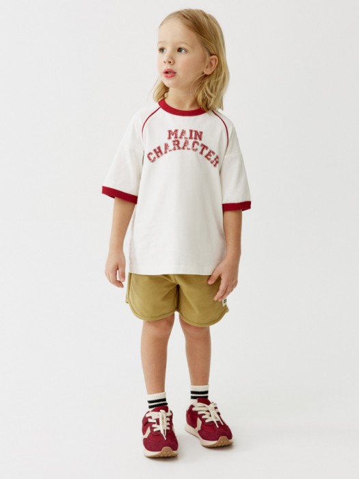 трикотажные шорты с патчем для мальчиков от бренда sela вид слева