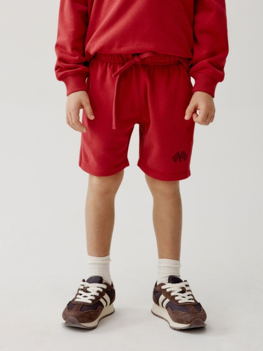 трикотажные шорты с принтом для мальчиков от бренда sela вид слева