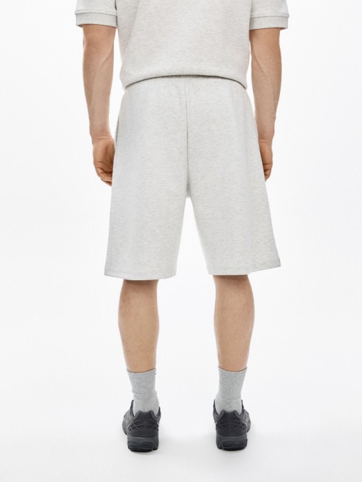 трикотажные удлиненные шорты по цене 2299 руб вид справа