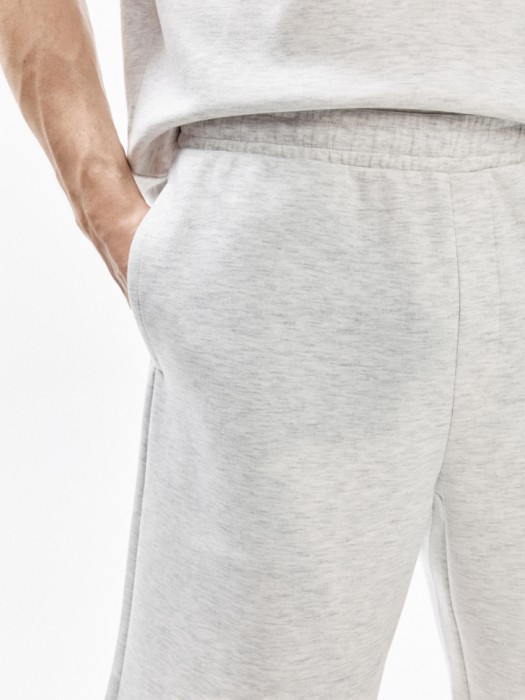 трикотажные удлиненные шорты из россии вид сбоку