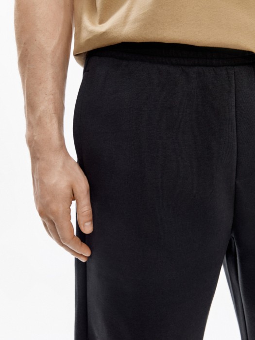 трикотажные удлиненные шорты из россии вид сбоку