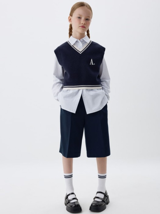 удлиненная рубашка для девочек от бренда sela вид слева