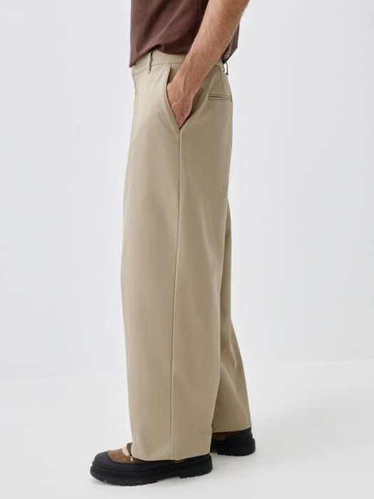 утепленные брюки свободного кроя из россии вид сбоку