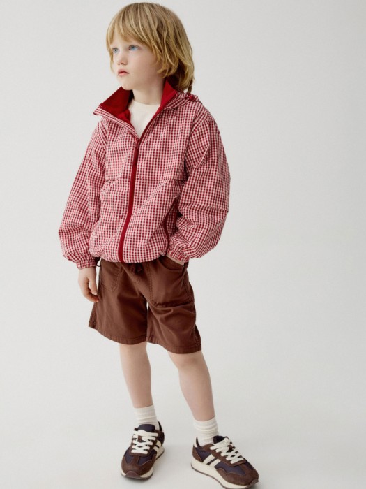 ветровка в клетку для мальчиков от бренда sela вид слева