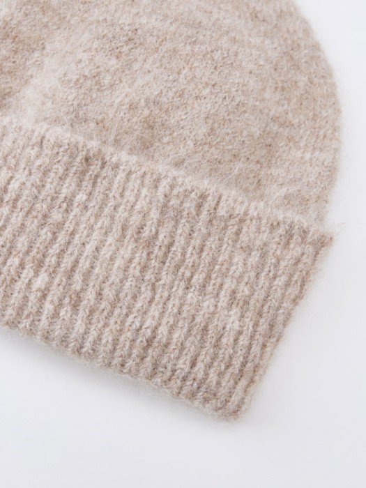 вязаная шапка из смесовой шерсти альпаки от бренда sela вид слева