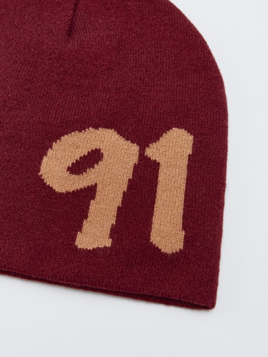 вязаная шапка с содержанием шерсти для мальчиков от бренда sela вид слева