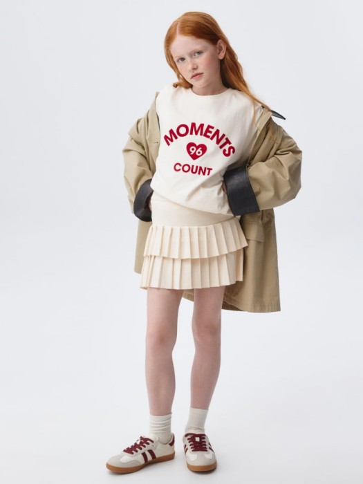 вязаная юбка в складку для девочек от бренда sela вид слева