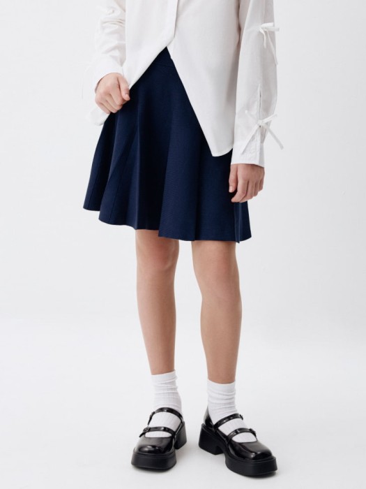 вязаная юбка в складку для девочек от бренда sela вид слева