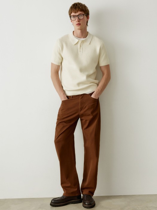 вязаное поло с коротким рукавом от бренда sela вид слева