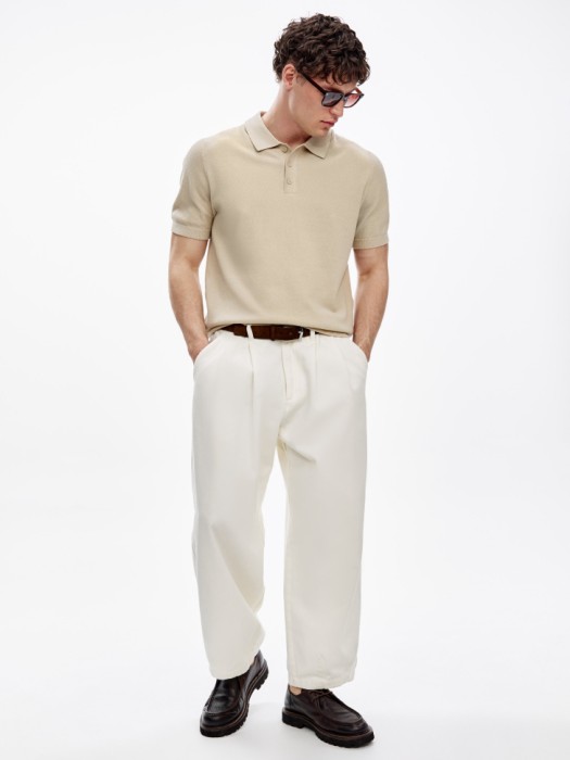 вязаное поло с коротким рукавом от бренда sela вид слева