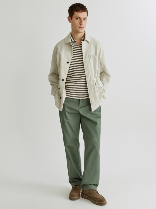 вязаное поло в полоску с коротким рукавом от бренда sela вид слева