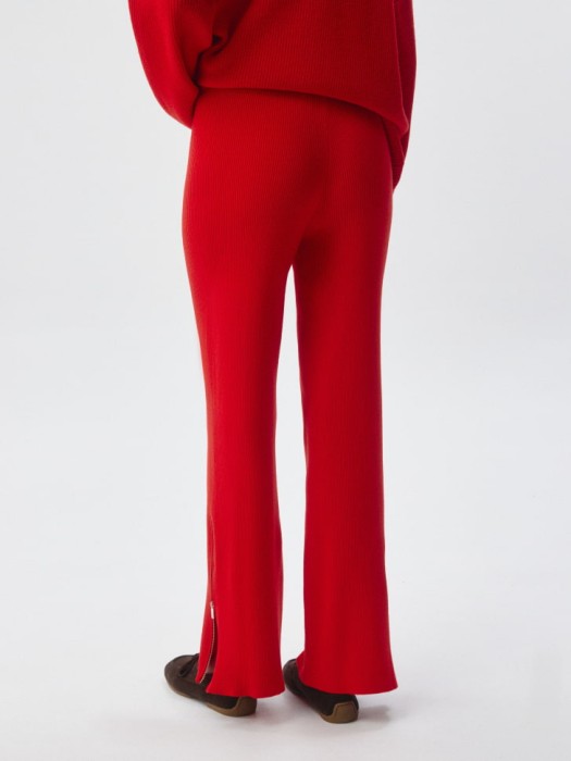 вязаные брюки в рубчик по цене 1999 руб вид справа