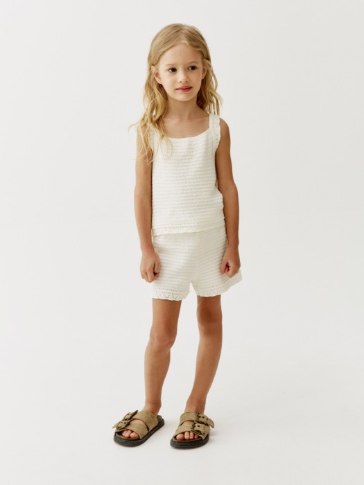 вязаный топ из ажурного трикотажа для девочек от бренда sela вид слева