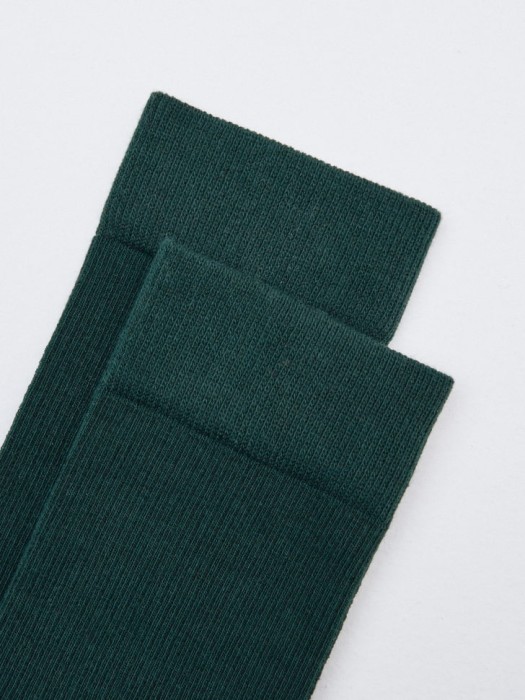 высокие носки в рубчик от бренда sela вид слева