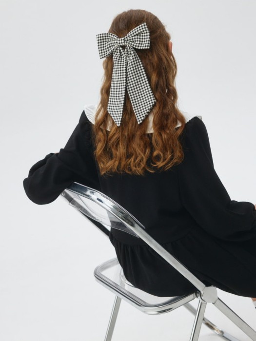 заколка для волос с бантом для девочек от бренда sela вид слева