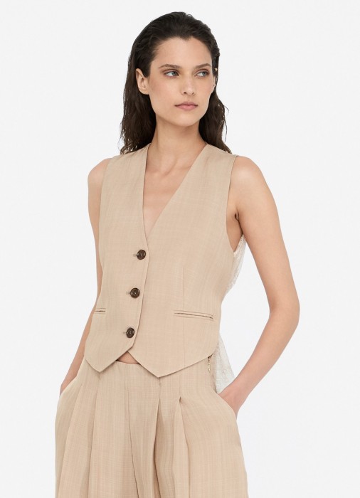 жилет женский  по цене 25120 руб вид справа