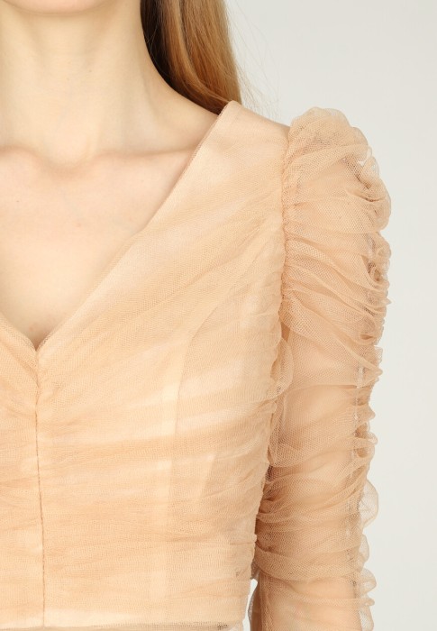 Товар бежевого цвета с внутренней стороны