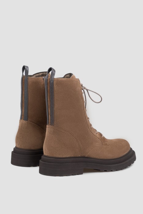 Товар коричневого цвета с внутренней стороны