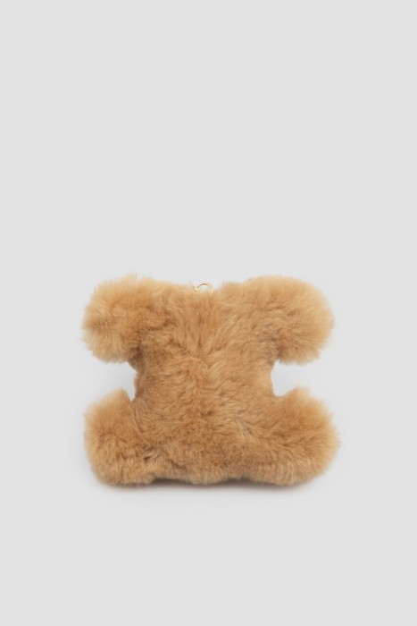 брелок  от бренда celine вид слева