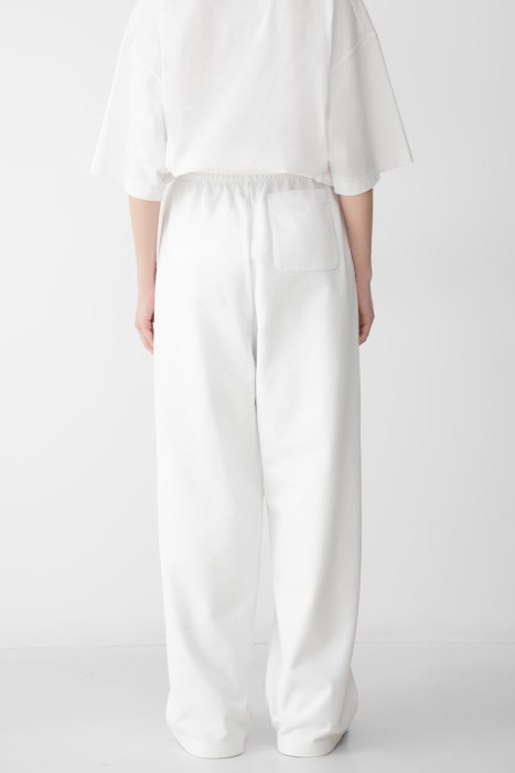 брюки  модель из лимитированной коллекции по цене 61000 руб вид справа