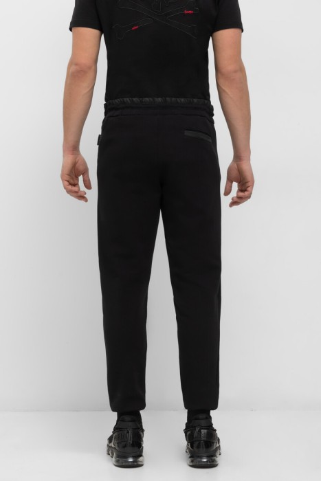 брюки спортивные  от бренда philipp plein вид слева