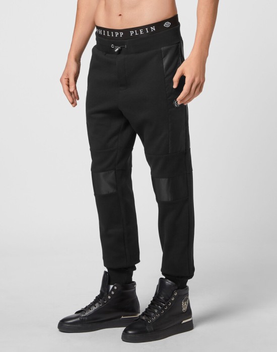 брюки спортивные  от бренда philipp plein вид слева