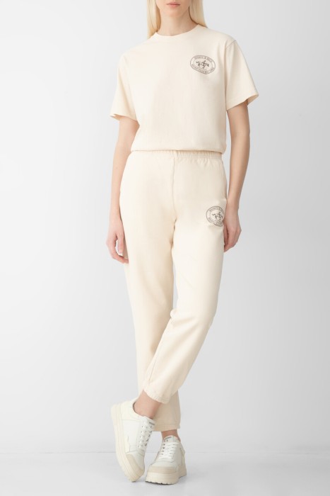 брюки sporty rich из хлопка спереди